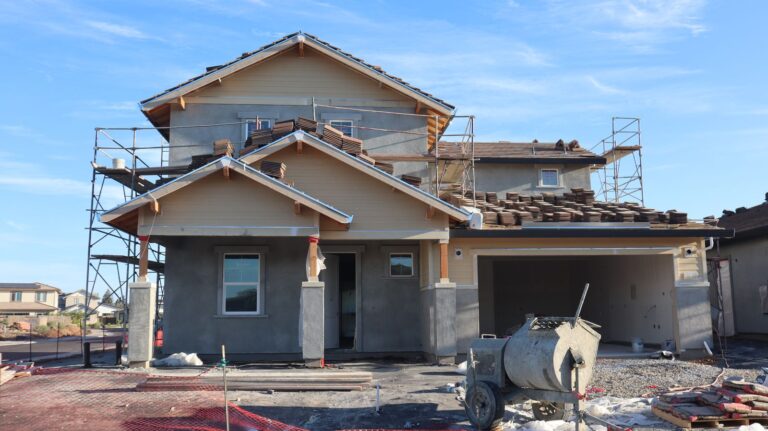 Two-story new construction home being built in a Central Texas subdivision